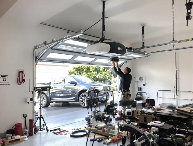 Longmont Garage Door Repair specialist installing smart garage door opener system in Longmont home