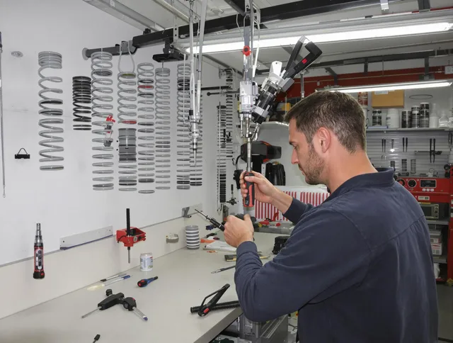 Longmont Garage Door Repair safety certified technician performing precision spring replacement in Longmont